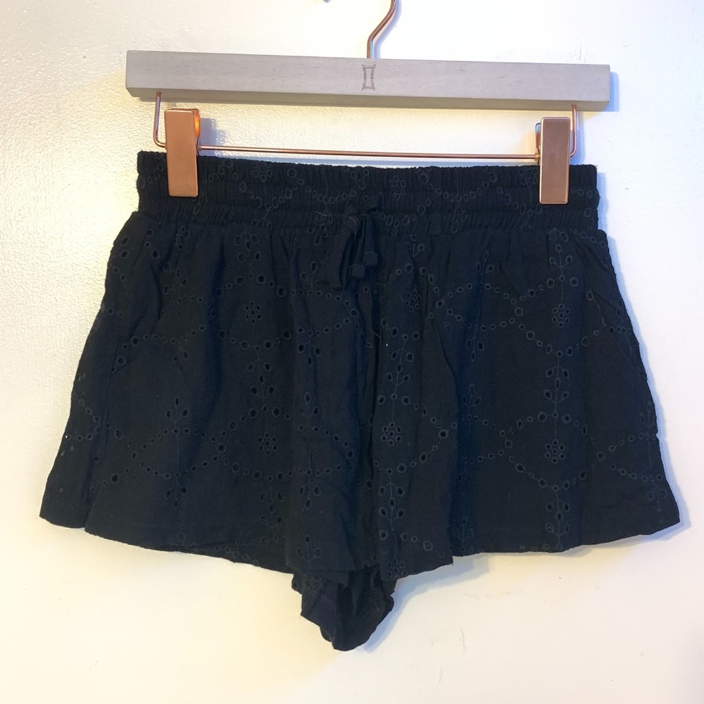 Black eyelet elastic shorts
